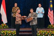 Disaksikan Presiden Jokowi, Mendagri Tito Sepakati Perjanjian Lintas Batas dengan Mendagri Malaysia